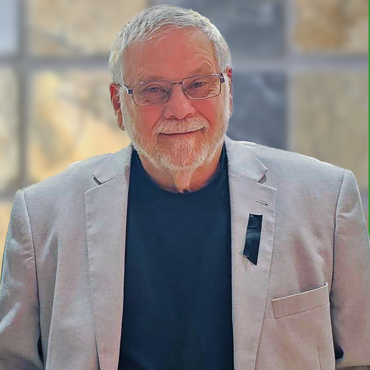 Edwin, grey jacket, smiling